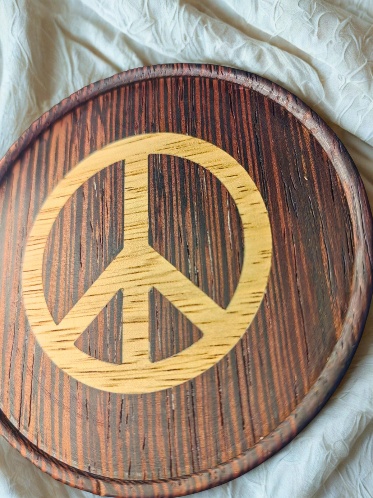 Wenge wood inlaid coaster. Nuclear disarmament symbol.