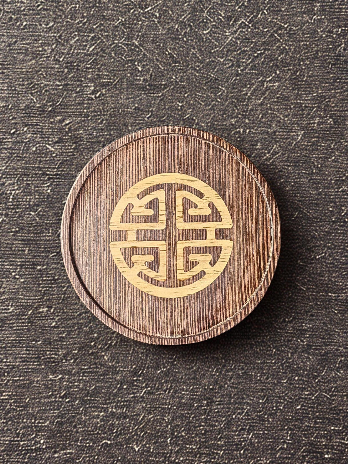 Wenge Wood Inlay Coaster with a "Symbol of Abundance" theme.