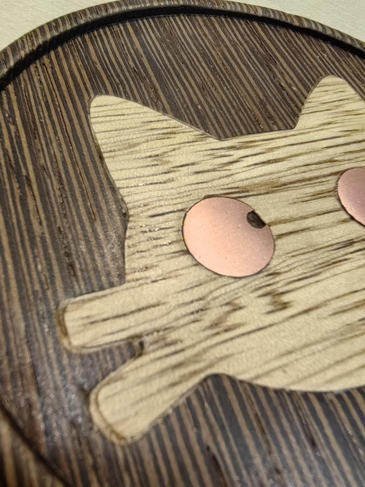 Wenge wood inlaid cat-themed coaster.