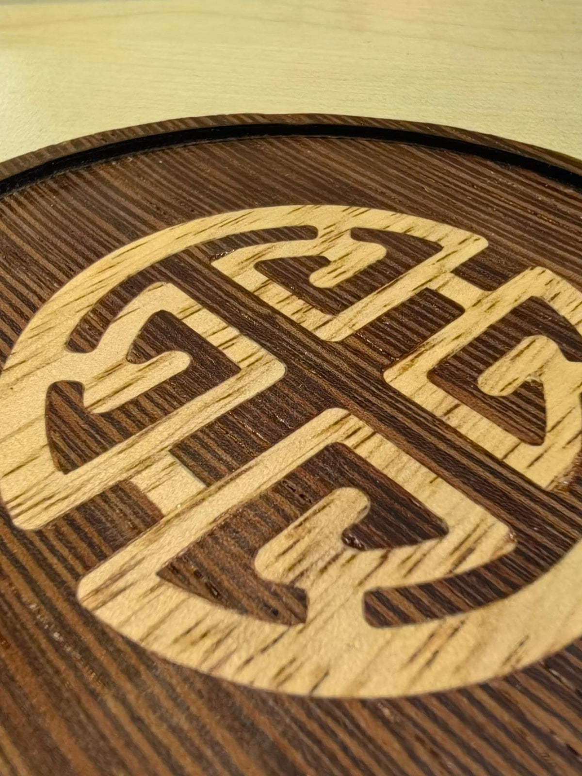 Wenge Wood Inlay Coaster with a "Symbol of Abundance" theme.
