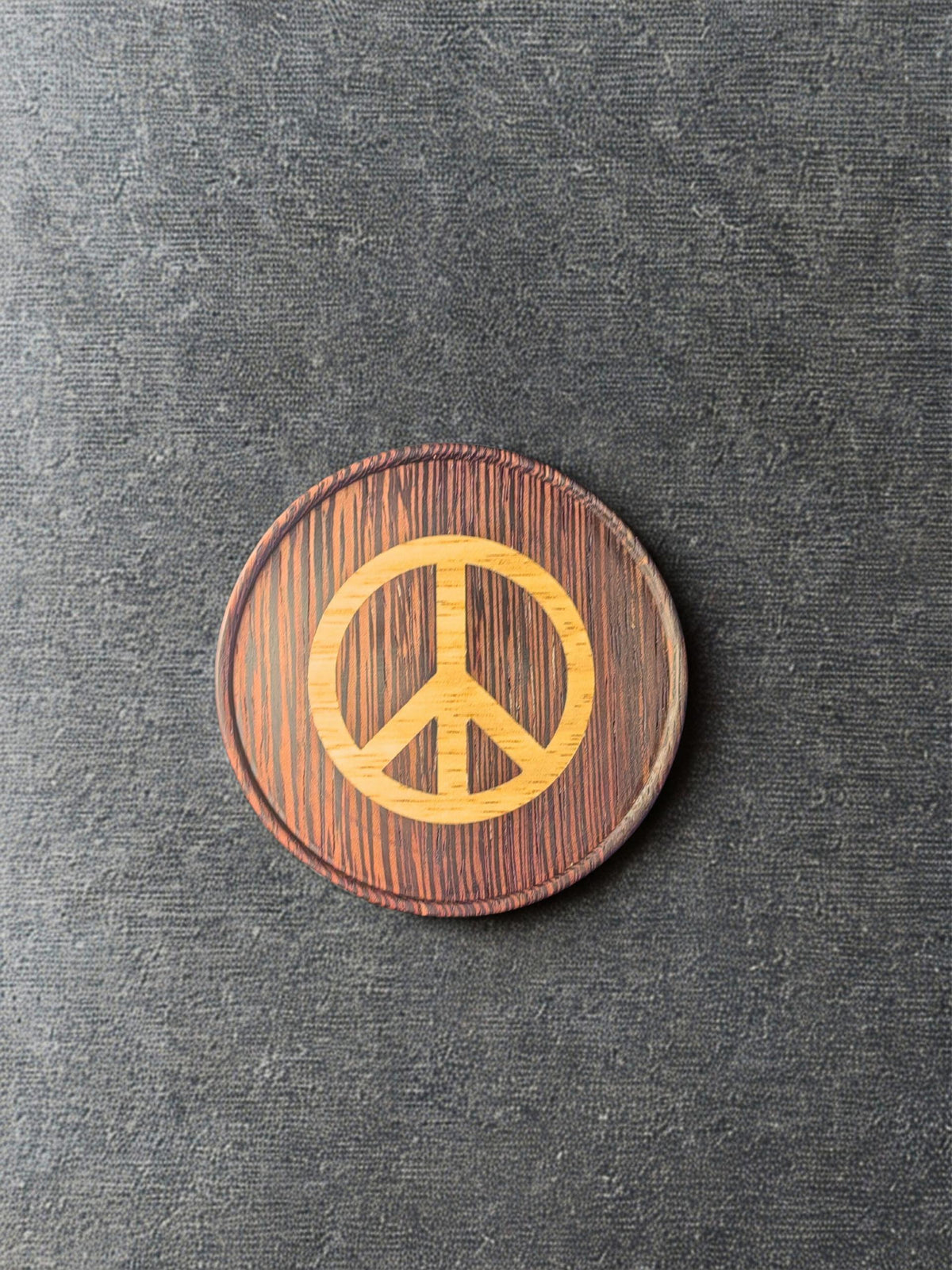 Wenge wood inlaid coaster. Nuclear disarmament symbol.